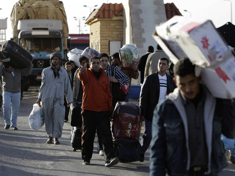 Many Egyptians who had been in Libya fed across the nations' boarder today (Feb. 22, 2011).