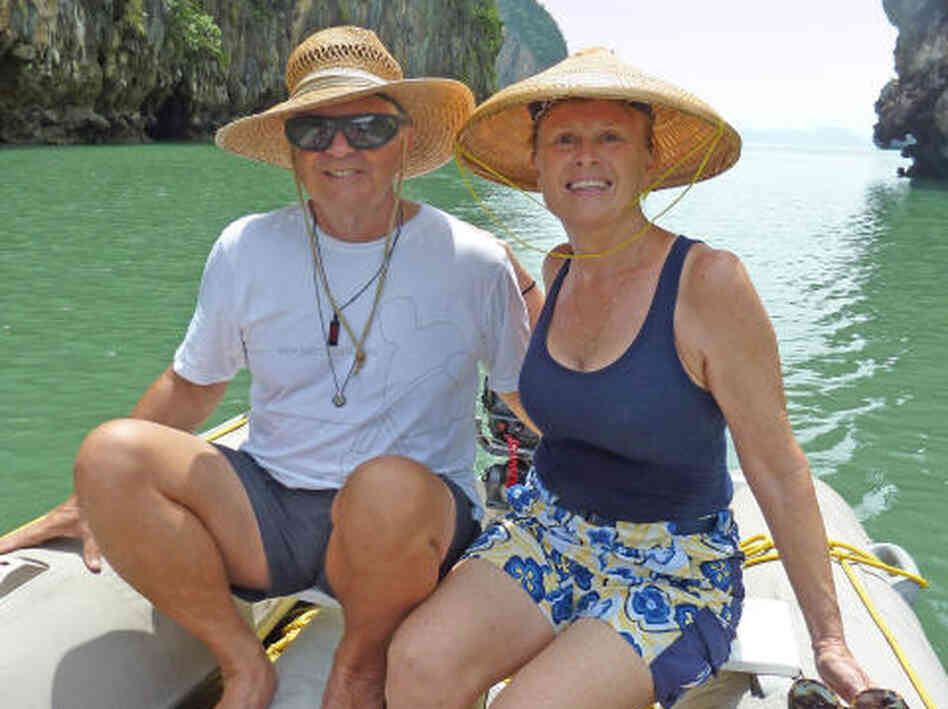 Scott and Jean Adam  pose in an undated photo posted on their website, svquest.com, which promotes  and documents their 'around-the-world' voyage and other travels since 2002.
