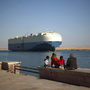 A cargo ship transits the Suez Canal en route from the Mediterranean Sea to the Gulf of Suez at the city of Suez, Egypt, on Feb. 2. Egypt controls the canal, which is vital to U.S. interests.