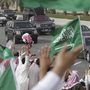 Saudis wave and cheer as the convoy of King Abdullah of Saudi Arabia passes through the streets of Riyadh on Wednesday. As the king returns from three months of medical treatments, he faces increasing demands for political reform. Saudis wave and cheer as the convoy of King Abdullah of Saudi Arabia passes through the streets of Riyadh on Wednesday. As the king returns from three months of medical treatments, he faces increasing demands for political reform.