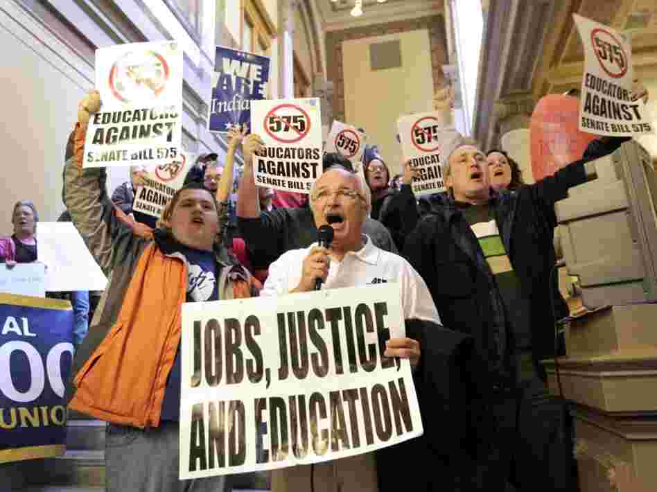 Rick Muir, president of the Indiana Federation  of Teachers, chants with other protesters at the statehouse in  Indianapolis on Feb. 23. Teacher groups are protesting Indiana Senate bill 575 which would remove some collective bargaining rights for teachers.