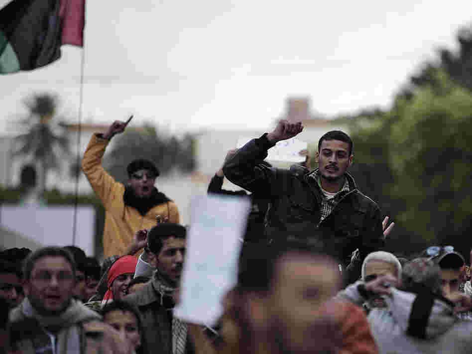Libyan  protesters shout anti-Gadhafi slogans during a demonstration in the eastern  Libyan town of Derna on Wednesday.