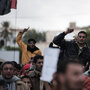 Libyan protesters shout anti-Gadhafi slogans during a demonstration in the eastern Libyan town of Derna on Wednesday. Libyan protesters shout anti-Gadhafi slogans during a demonstration in the eastern Libyan town of Derna on Wednesday.