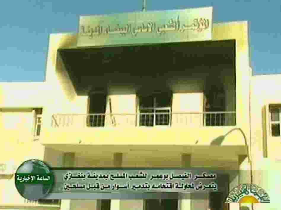 An image broadcast on Libyan state television on Sunday shows damage caused by fire to the local council building in the eastern city of Bayda. The city is now in the hands of anti-Gadhafi rebels who are forming a provisional government.