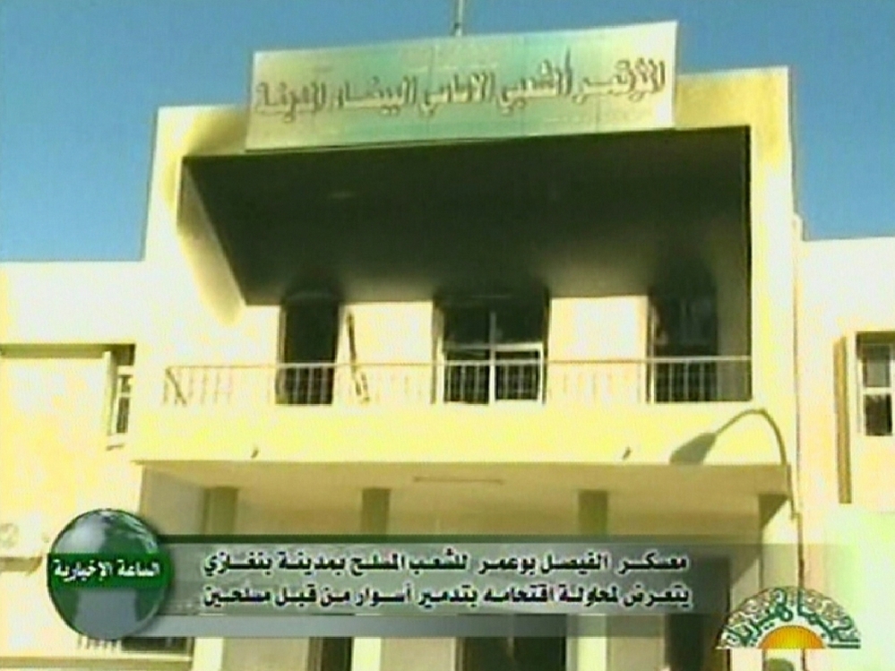 An image broadcast on Libyan state television on Sunday shows damage caused by fire to the local council building in the eastern city of Bayda. The city is now in the hands of anti-Gadhafi rebels who are forming a provisional government. An image broadcast on Libyan state television on Sunday shows damage caused by fire to the local council building in the eastern city of Bayda. The city is now in the hands of anti-Gadhafi rebels who are forming a provisional government.