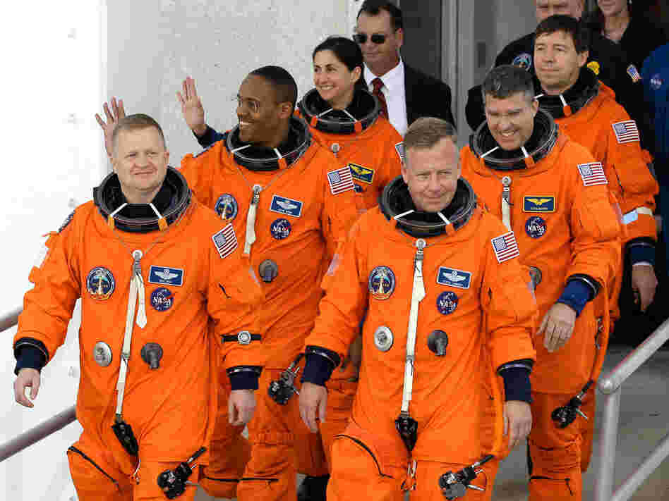 Discovery's final crew heads to the launchpad Thursday. Front row from left: Pilot Eric Boe, Commander Steve Lindsey. Second row: Mission Specialist Alvin Drew, Steve Bowen. Third row from left: Nicole Stott and Michael Barratt. Discovery's final crew heads to the launchpad Thursday. Front row from left: Pilot Eric Boe, Commander Steve Lindsey. Second row: Mission Specialist Alvin Drew, Steve Bowen. Third row from left: Nicole Stott and Michael Barratt.