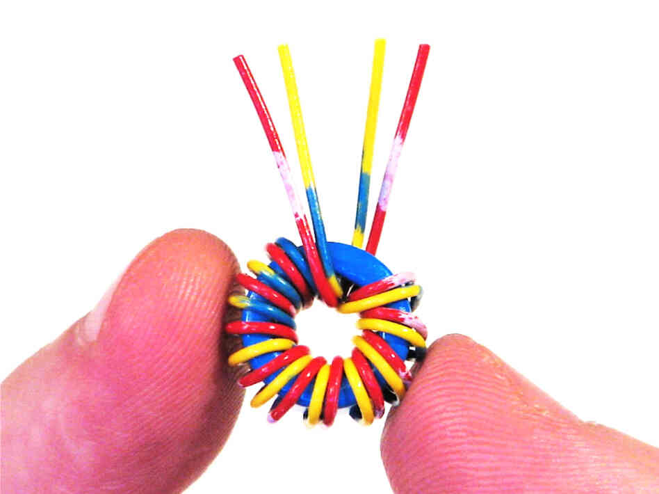 Hand-wound ferrite toroid.
