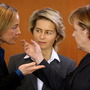 German Family Minister Kristina Schroeder (from left), Labor Minister Ursula von der Leyen and Chancellor Angela Merkel speak before a Cabinet meeting. Germany's 14-member Cabinet has five women, but women make up only 8.2 percent of the country's corporate board members.