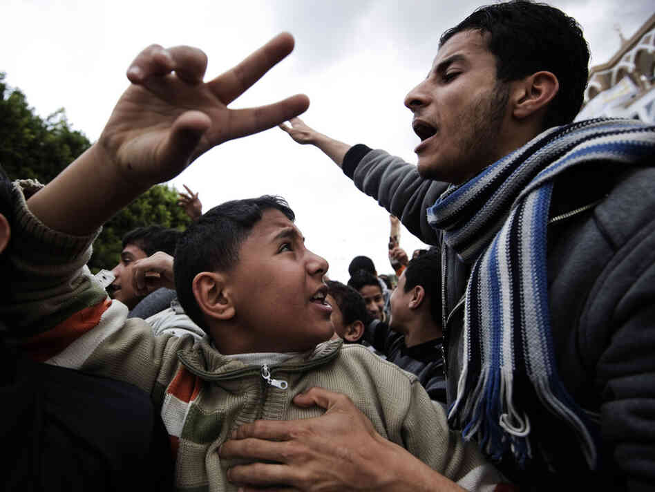 Libyans shout anti-Gadhafi slogans during a demonstration in the eastern town of Derna, between Tobruk and Benghazi.