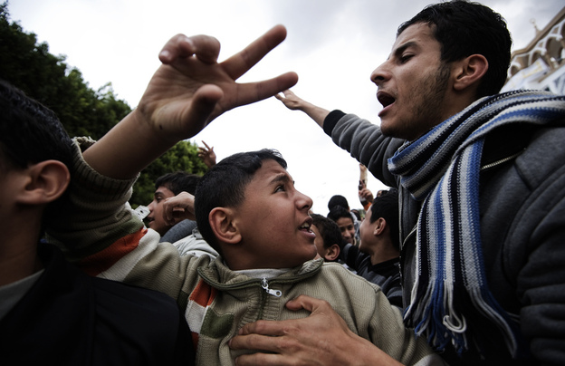 Libyans shout anti-Gadhafi slogans during a demonstration in the eastern town of Derna, between Tobruk and Benghazi.