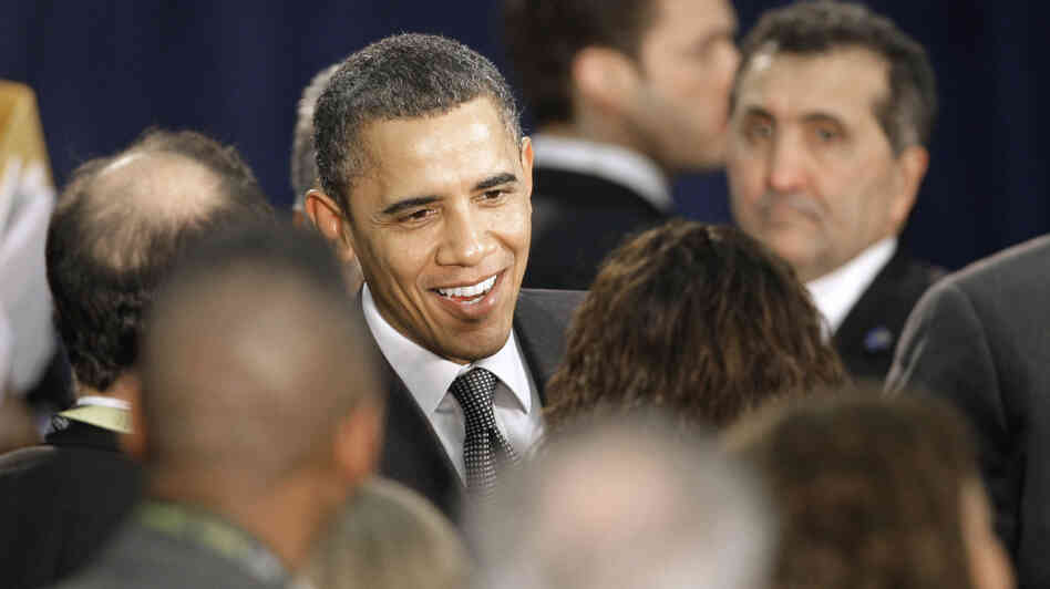 President Obama greets supporters after giving closing remarks Tuesday at a small business forum at Cleveland State University. Obama has only weighed in once on the union protests in Indiana, Ohio and Wisconsin.