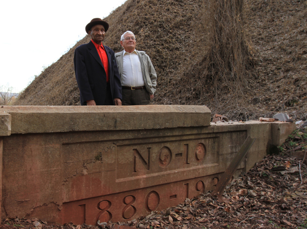 Former miners Willie Cammack (left) and Amos Horton, standing at the entrance to the No. 10 mine where they used to work.