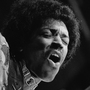 The late rock guitar virtuoso Jimi Hendrix, pictured in August 1970, performs at the Isle of Wight Festival in England.