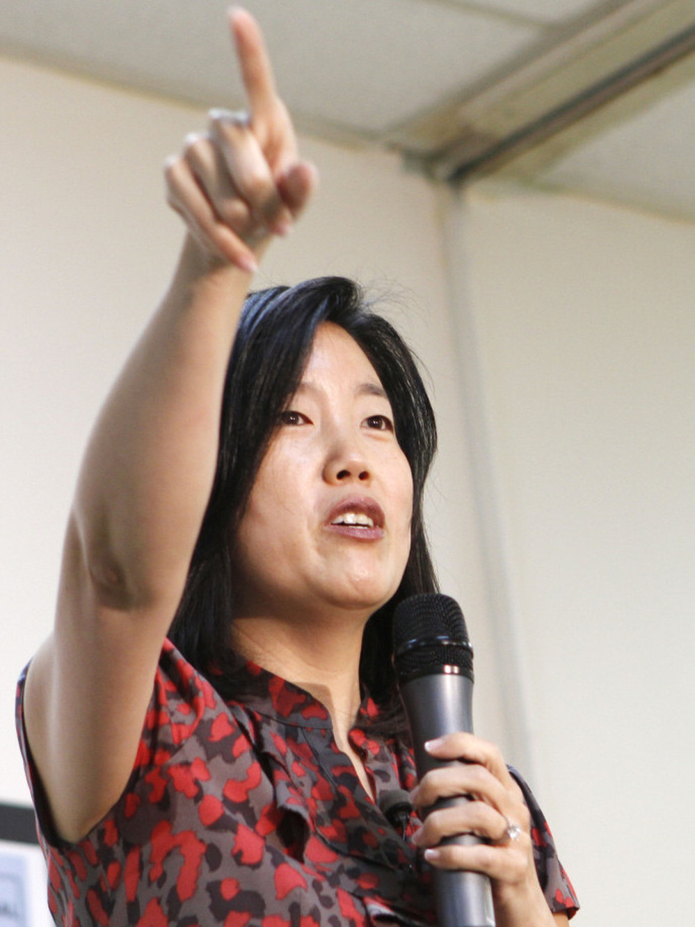 Michelle Rhee, former chancellor of Washington, D.C., public schools, speaks to staff and guests during a visit to a South Florida charter school in January.