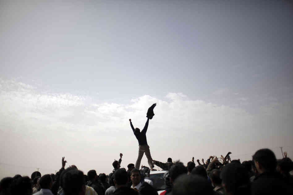 Libyan rebels in the northeastern city of Ajdabiya celebrate reports that the counterattacks led by Libyan leader Moammar Gadhafi have failed, on March 2. 