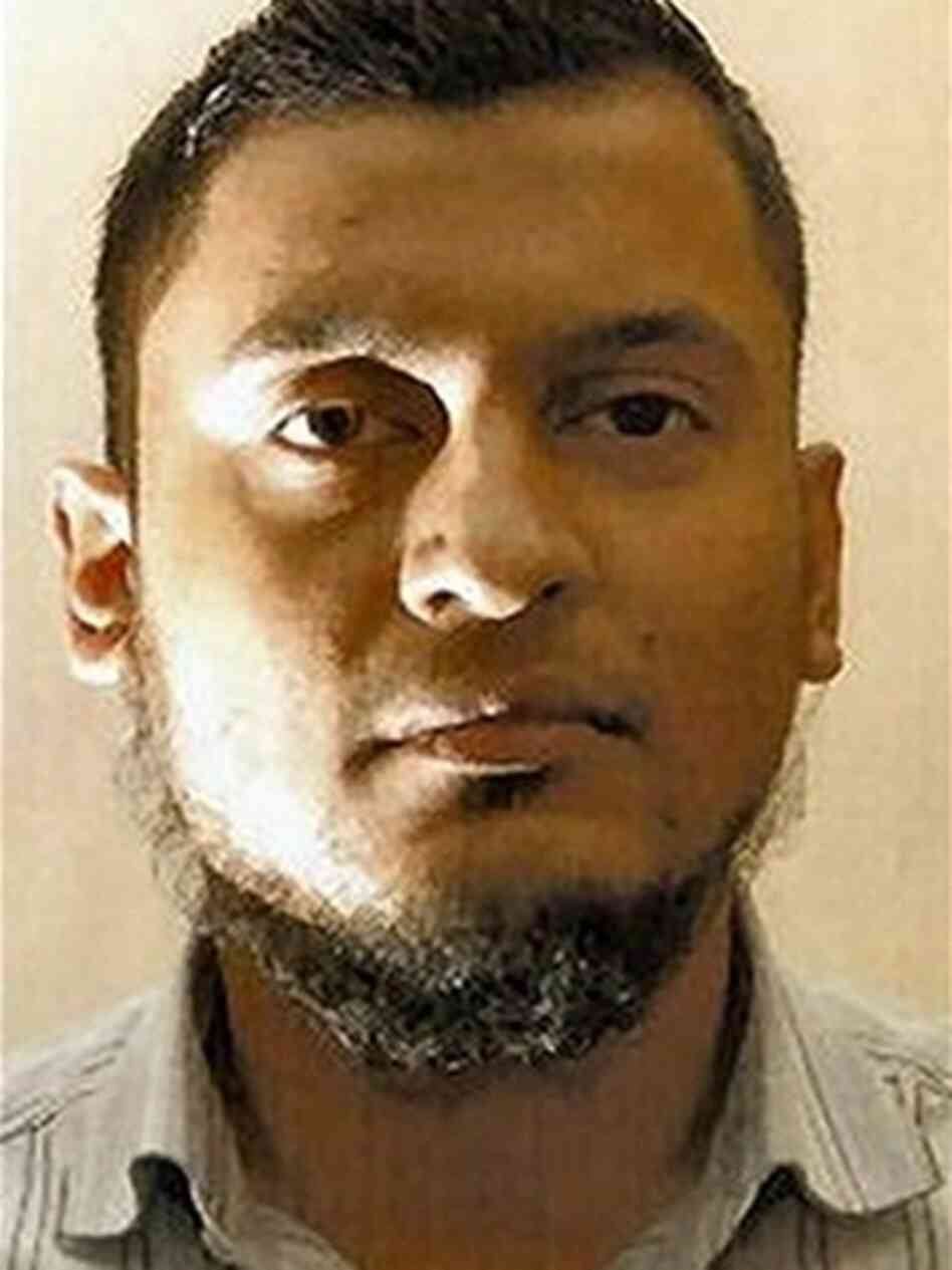 A jury has convicted former British Airways computer specialist Rajib Karim, seen in a photo provided by the police, of plotting with U.S.-born extremist cleric Anwar al-Awlaki to blow up an airplane.