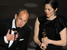 The winners of the Best Documentary Feature "Inside Job," Charles Ferguson and Audrey Marrs address the audience the 83rd Annual Academy Awards. The winners of the Best Documentary Feature "Inside Job," Charles Ferguson and Audrey Marrs address the audience the 83rd Annual Academy Awards.