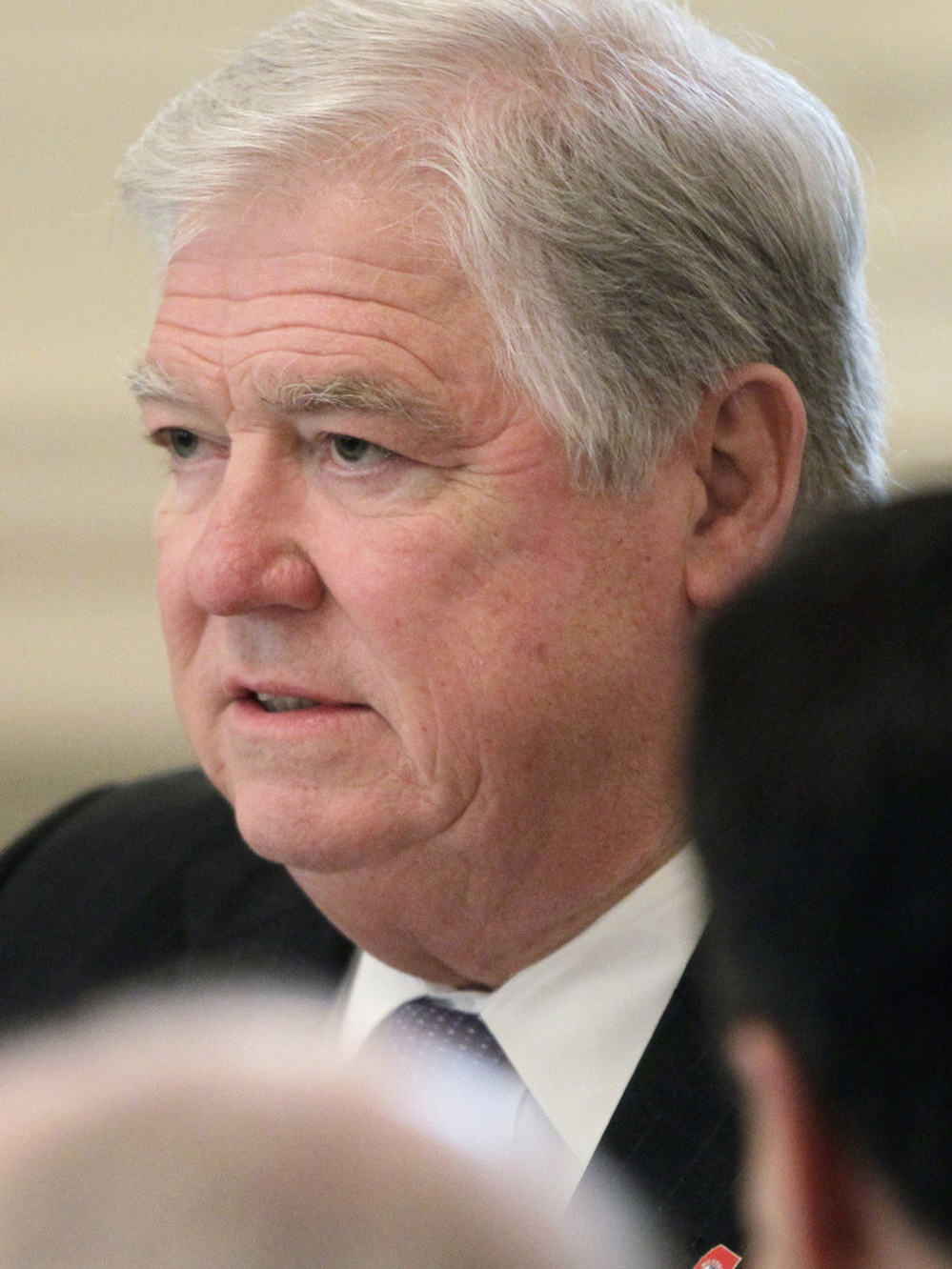 Mississippi Gov. Haley Barbour listens to President Obama at the White House, Monday, Feb. 28, 2011.
