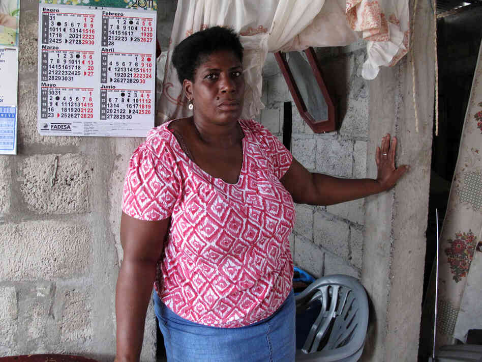 Ayobi  lives in a cinder block house on the outskirts of Guayaquil. She  says it's not an easy place to raise a  child.