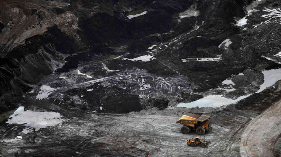 Rising crude oil prices and improved extraction methods have made exploitation of Canada's oil sands more economical. Here, a view of an oil sands mine near Fort McMurray, Alberta. Rising crude oil prices and improved extraction methods have made exploitation of Canada's oil sands more economical. Here, a view of an oil sands mine near Fort McMurray, Alberta.