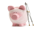 Bandaged piggy bank with crutches. Bandaged piggy bank with crutches.