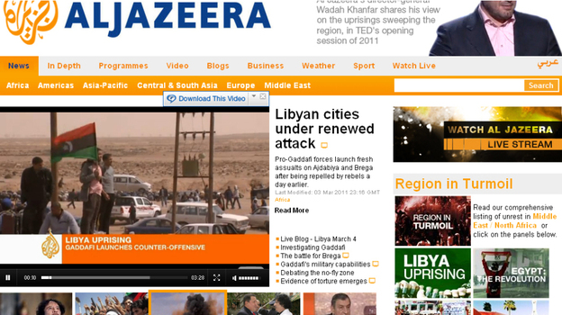 A screenshot shows the Al Jazeera English website. The network has been providing around the clock coverage of unrest in the Middle East.