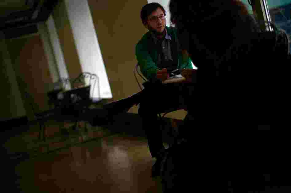 John Alter, intake coordinator for the Times Square Building, interviews a prospective tenant. There are no longer any chronically homeless people living in Times Square.