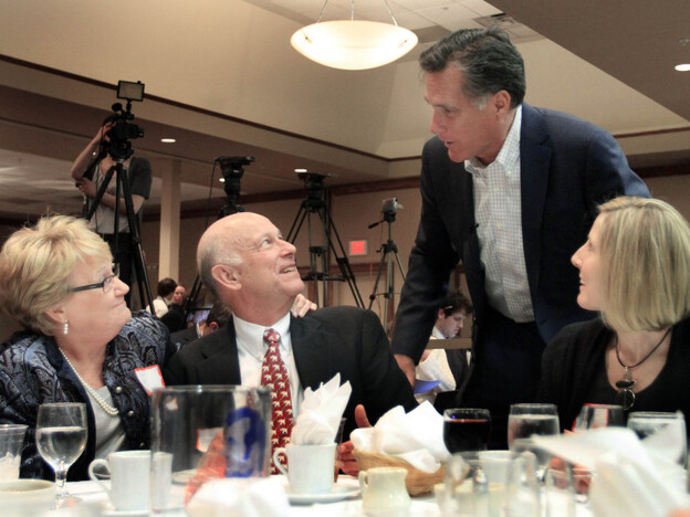 Mitt Romney worked the tables in New Hampshire at a Carroll County Republican dinner, Saturday, March 5, 2011.