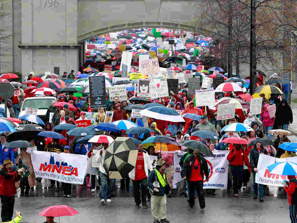 People opposing legislative efforts to do away with teachers' collective bargaining rights march to the Legislative Plaza for a March 5 rally in Nashville, Tenn. Protesters from the Tea Party as well as the Tennessee Education Association converged on the state Capitol to voice competing views on the issue. People opposing legislative efforts to do away with teachers' collective bargaining rights march to the Legislative Plaza for a March 5 rally in Nashville, Tenn. Protesters from the Tea Party as well as the Tennessee Education Association converged on the state Capitol to voice competing views on the issue.