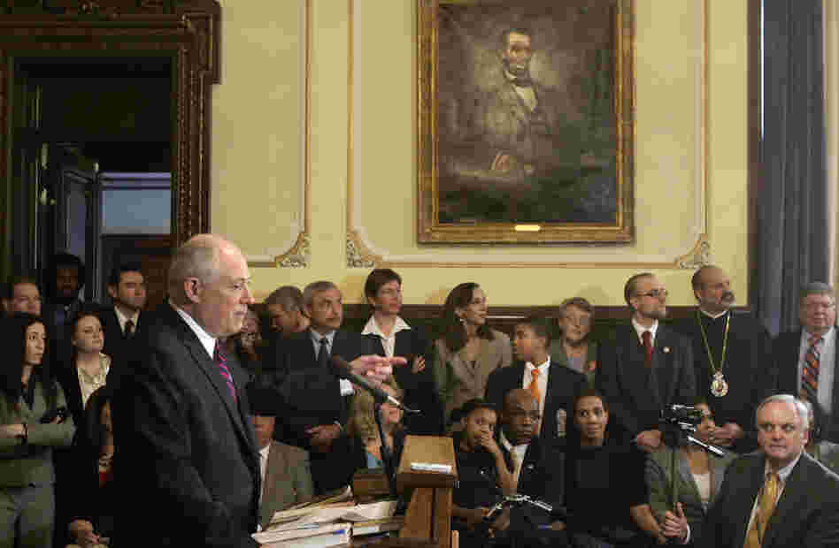 Illinois Gov. Pat Quinn speaks with reporters after signing legislation abolishing the death penalty in the state at the capitol in Springfield on Wednesday.