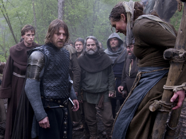 Suffer, Witch: The church, for its part, deploys an enforcer (Sean Bean, center, with Eddie Redmayne, left) who's got decidedly medieval ideas about uppity women.