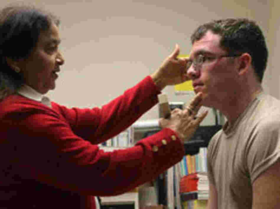 Spc. Joseph Chroniger, who has bone spurs in his neck, hopes acupuncture from Dr. Shashi Kumar at Madigan Army Medical Center will give him relief from pain. Spc. Joseph Chroniger, who has bone spurs in his neck, hopes acupuncture from Dr. Shashi Kumar at Madigan Army Medical Center will give him relief from pain.
