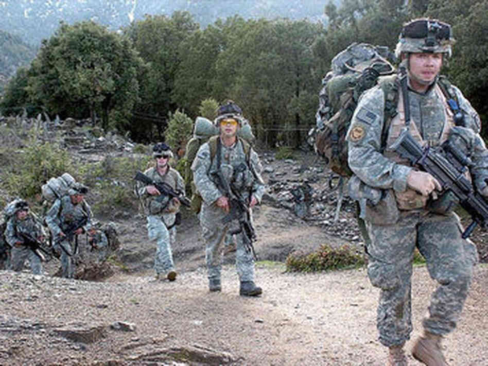 Army Pfc. Ronald Craig (right) and fellow soldiers of the 3rd Platoon, Combat Company, 1-32 Infantry, return from a two-week patrol in Afghanistan. Army Pfc. Ronald Craig (right) and fellow soldiers of the 3rd Platoon, Combat Company, 1-32 Infantry, return from a two-week patrol in Afghanistan.