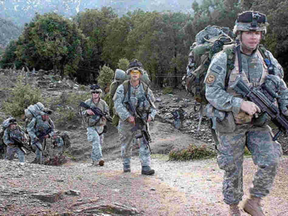 Army Pfc. Ronald Craig (right) and fellow soldiers of the 3rd Platoon, Combat Company, 1-32 Infantry, return from a two-week patrol in Afghanistan. Army Pfc. Ronald Craig (right) and fellow soldiers of the 3rd Platoon, Combat Company, 1-32 Infantry, return from a two-week patrol in Afghanistan.
