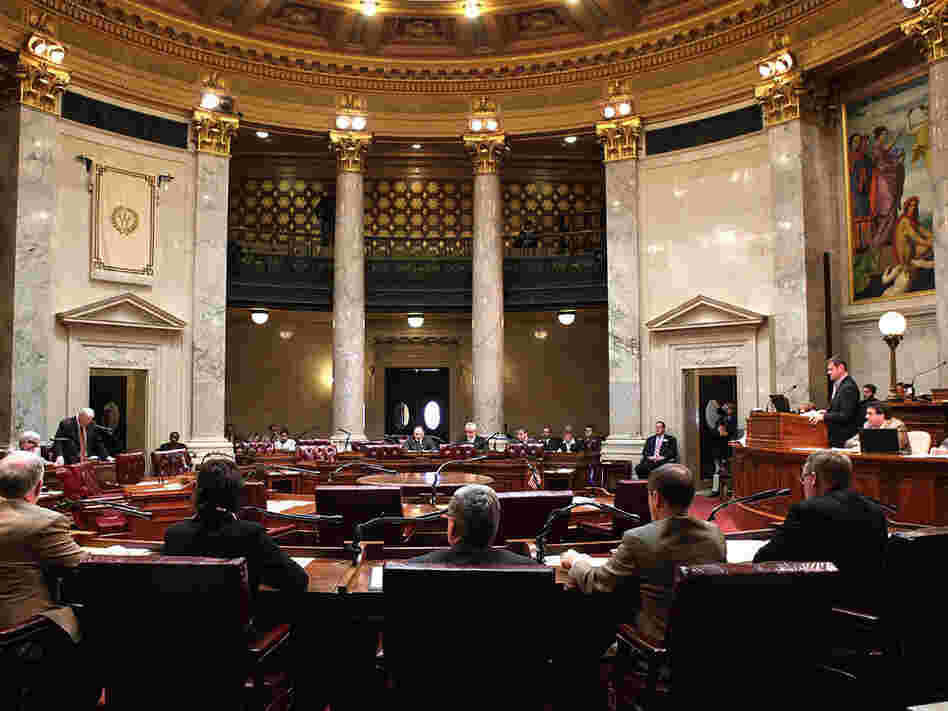 Democrats' chairs sat empty during the Senate vote on Gov. Scott Walker's legislation that would restrict collective bargaining for most government workers in Wisconsin. Republicans voted 18-1 to pass the bill. Democrats' chairs sat empty during the Senate vote on Gov. Scott Walker's legislation that would restrict collective bargaining for most government workers in Wisconsin. Republicans voted 18-1 to pass the bill.
