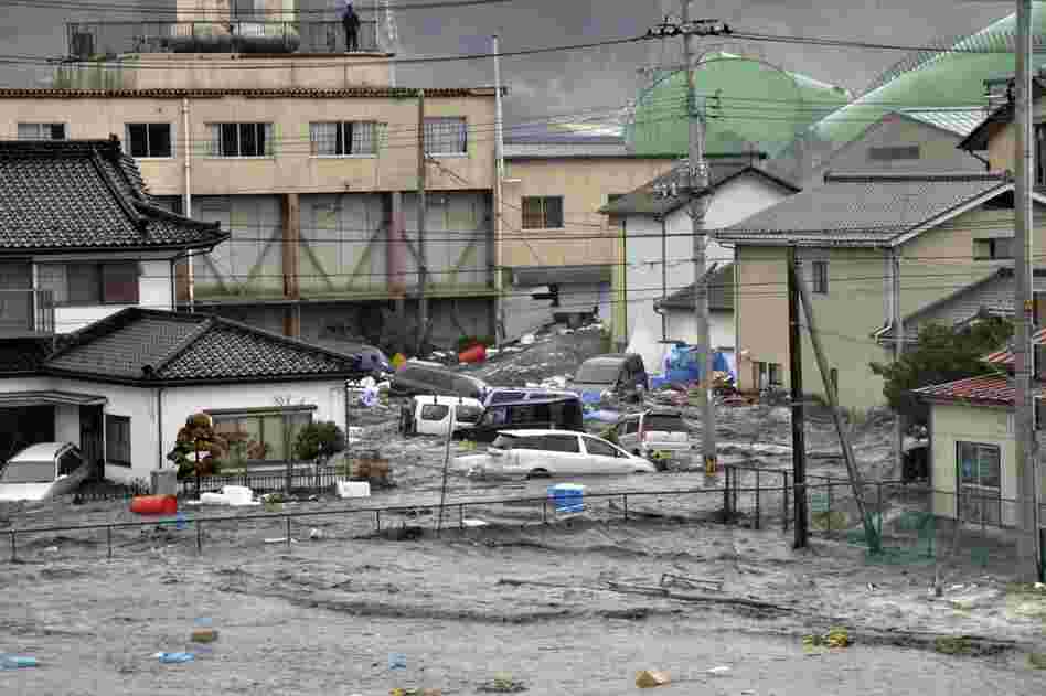 Houses are flooded in Kesennuma city in Miyagi prefecture, northern Japan. 