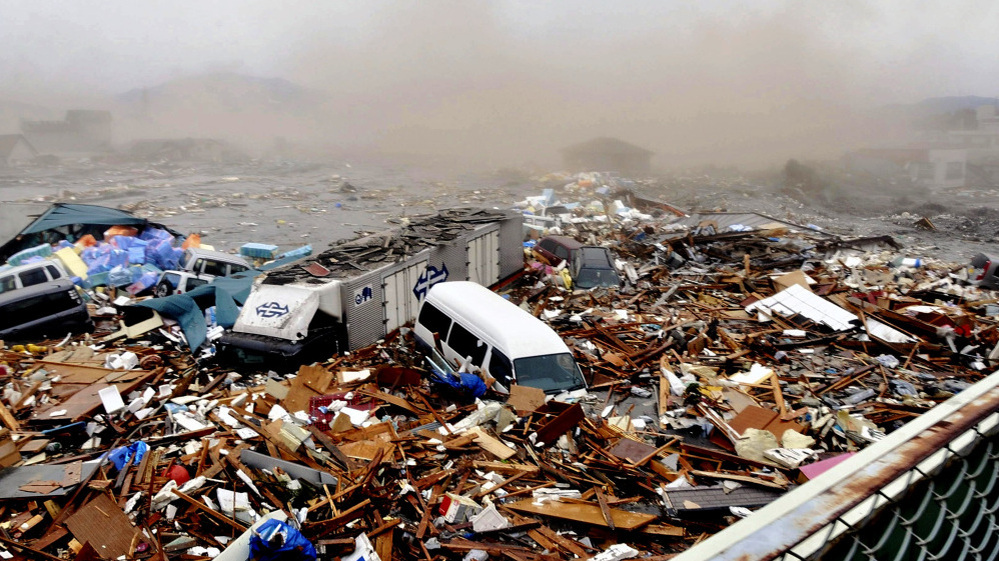 Cars and other debris swept away by tsunami tidal waves, Kesennuma in Miyagi Prefecture, northern Japan.