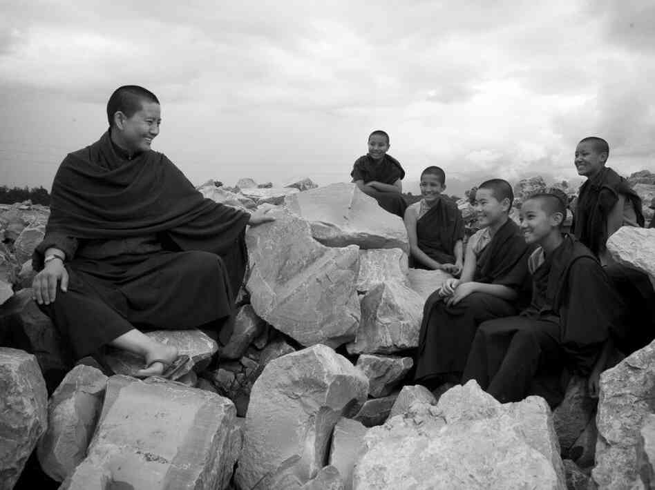 Ani Choying Drolma sits with her students. In 2000, Drolma founded The Arya Tara school — the first school in  Nepal to offer both Western and traditional Tibetan studies to nuns.