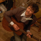 The David Wax Museum performs at a house show.