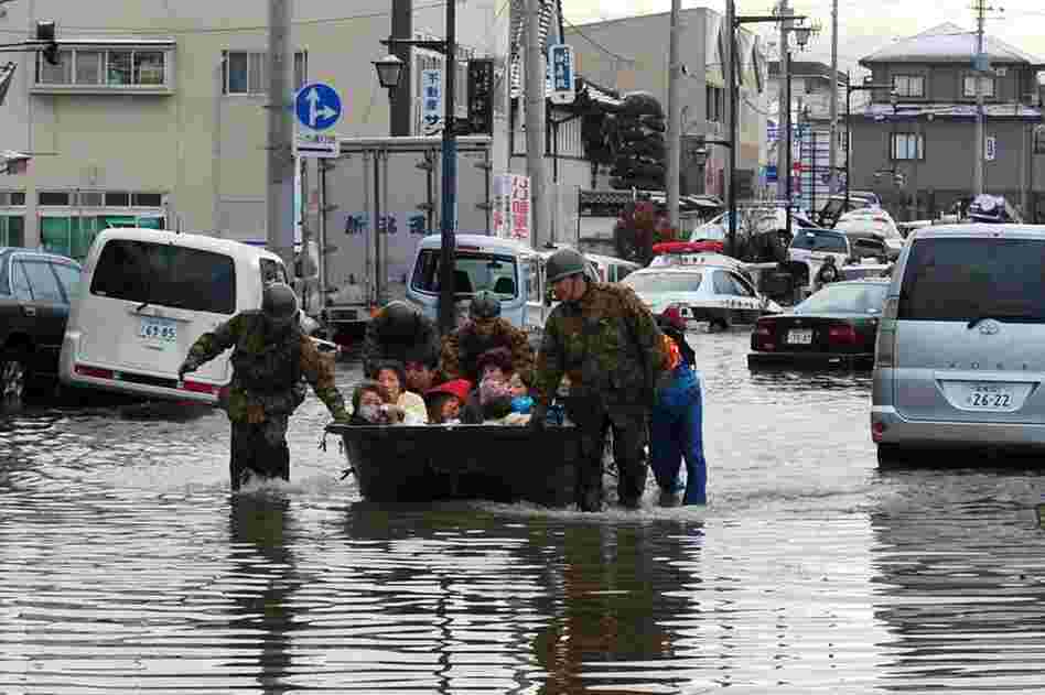 Soldiers evacuate residents of Tagajo in northern Japan. 