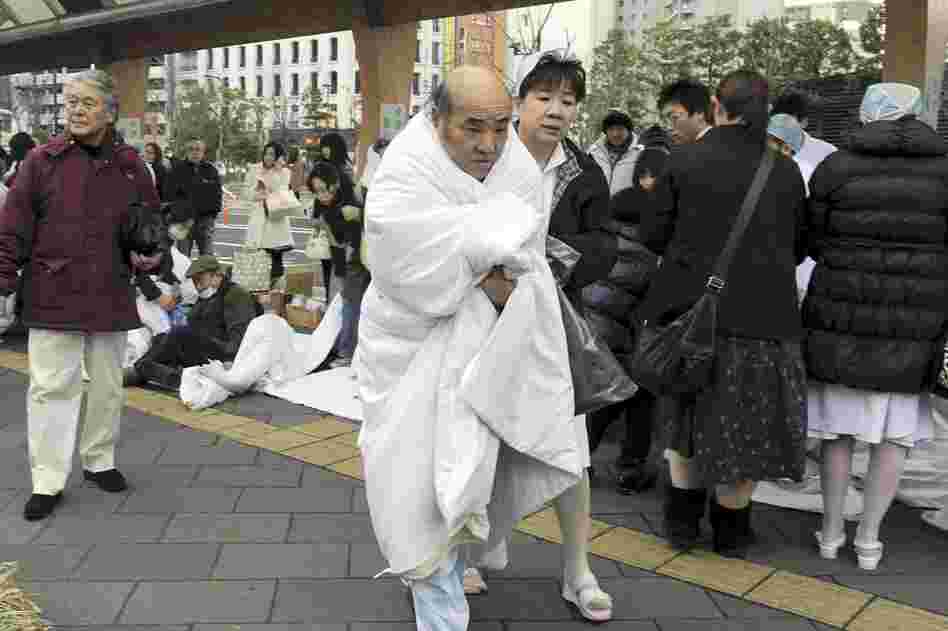 A hospital in Sendai, Miyagi prefecture, is evacuated following the magnitude 8.9 earthquake and tsunami that hit Japan on Friday.  