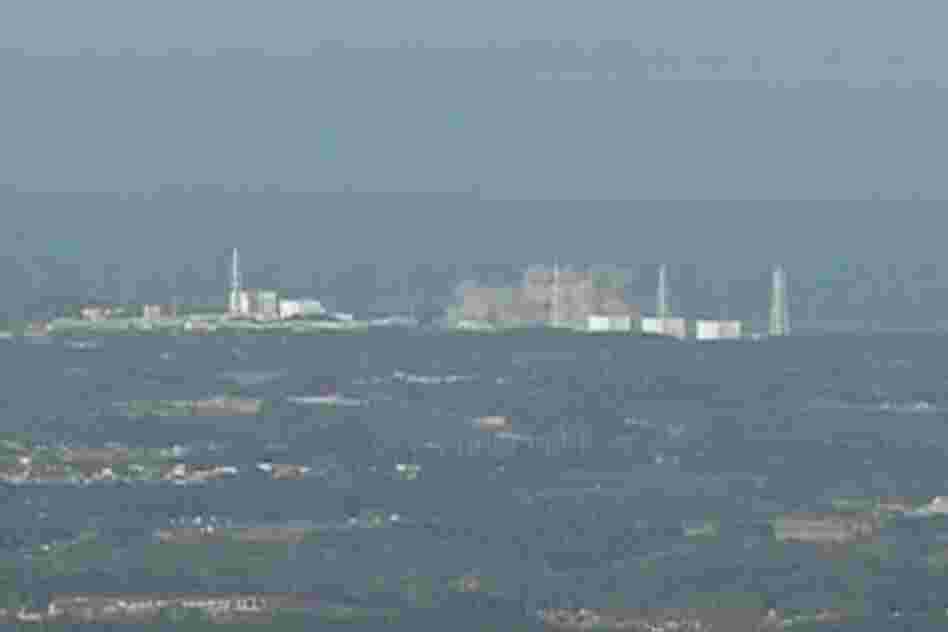 Smoke rises from the Fukushima nuclear power plant following an explosion that spewed large amounts of radiation. 