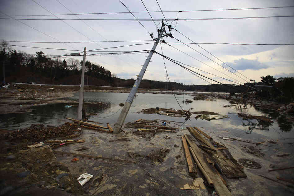 Electric poles are left leaning in Daigasaki, near Sendai, Miyagi prefecture. 