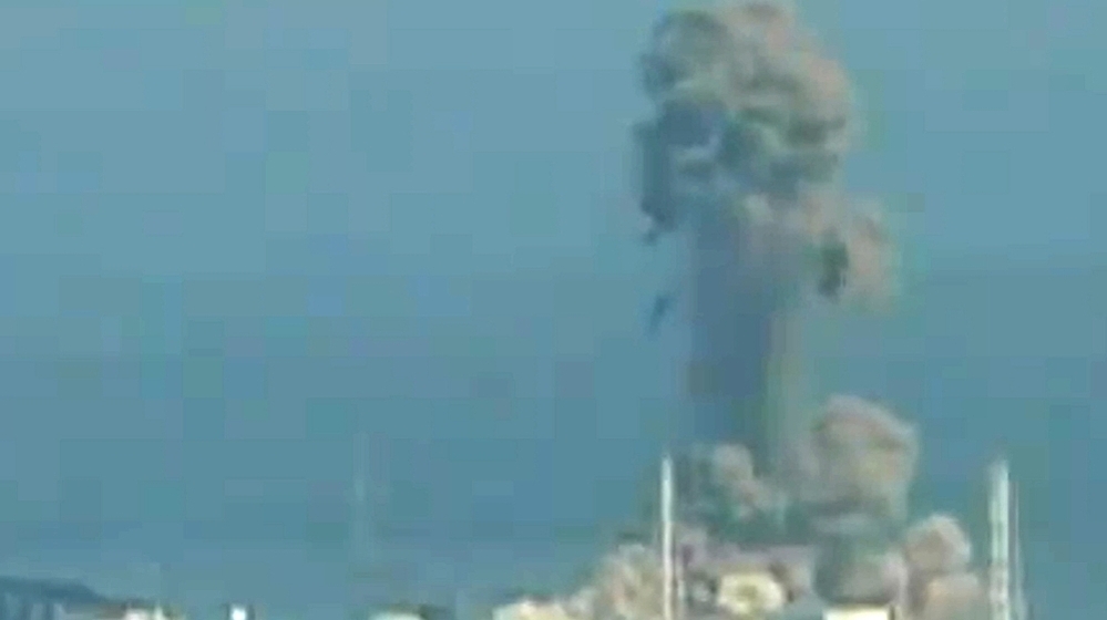 A screen grab taken from news footage by Japanese public broadcaster NHK shows the moment of a hydrogen explosion at the Fukushima No. 1 nuclear power station number three reactor on Monday.