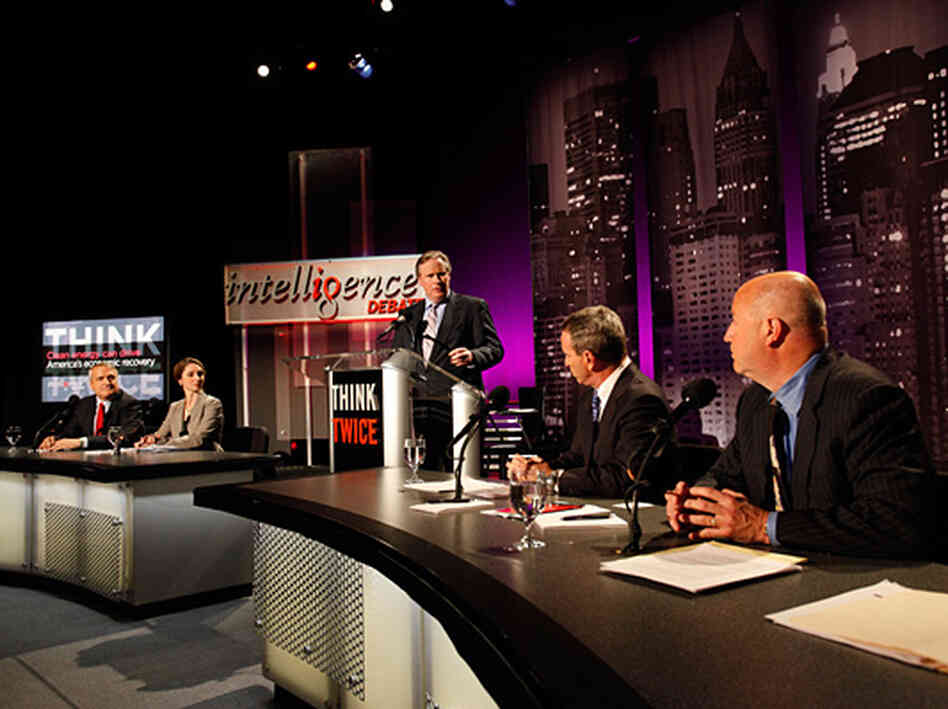 Two teams of experts face off over clean energy at an Intelligence Squared U.S. debate on March 8 at New York University's Skirball Center for the Performing Arts. From left: Bill Ritter, Kassia Yanosek, moderator John Donvan, Robert Bryce and Steven Hayward. Two teams of experts face off over clean energy at an Intelligence Squared U.S. debate on March 8 at New York University's Skirball Center for the Performing Arts. From left: Bill Ritter, Kassia Yanosek, moderator John Donvan, Robert Bryce and Steven Hayward.