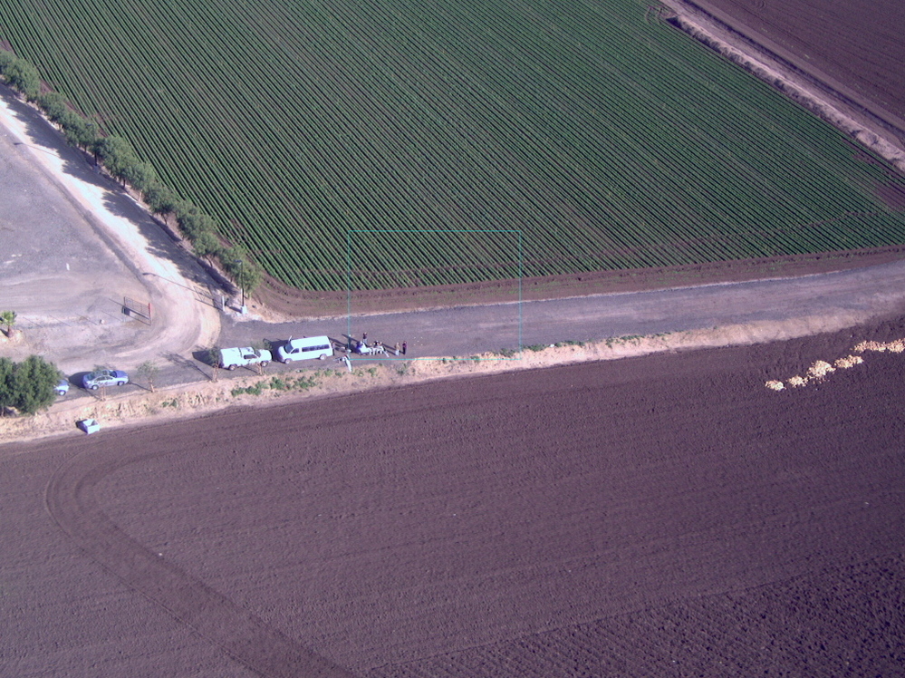 An image taken by the Puma drone of NPR's Carrie Kahn as she reported this story. Enlarge to see Kahn (far right) and the team from AeroVironment on the ground.