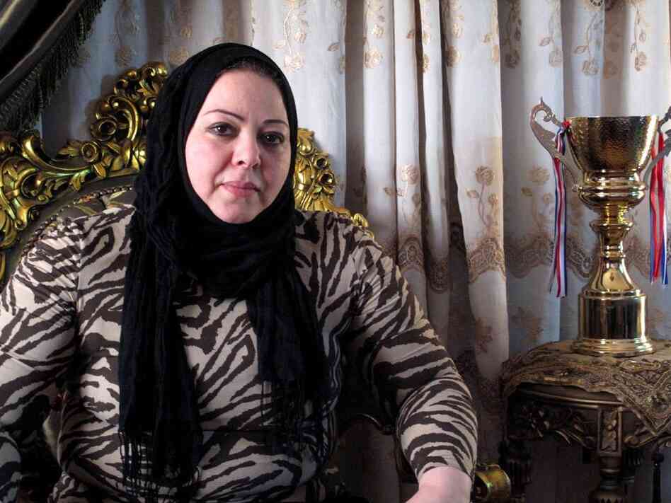 Essam's mother, Iman El-Minshawi, says she was terrified at first that her son was taking such an active role in the revolution, but now thinks of him as a hero.