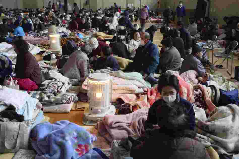 Evacuees rest at a shelter in Yamada, Iwate prefecture, in northern Japan on Tuesday. 