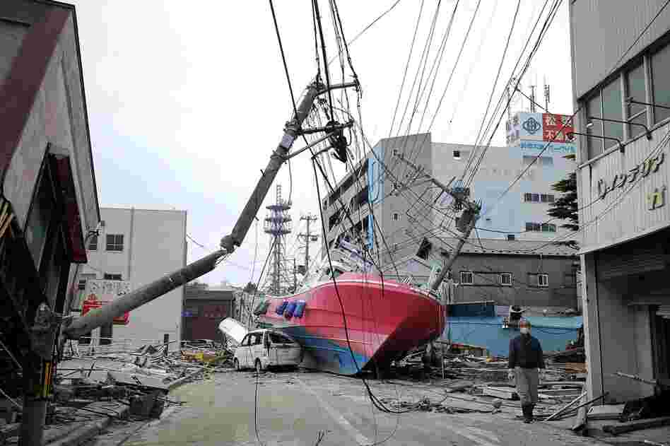 A boat lies in a street in Hishonomaki, Miyagi prefecture, washed inland by the recent tsunami. 