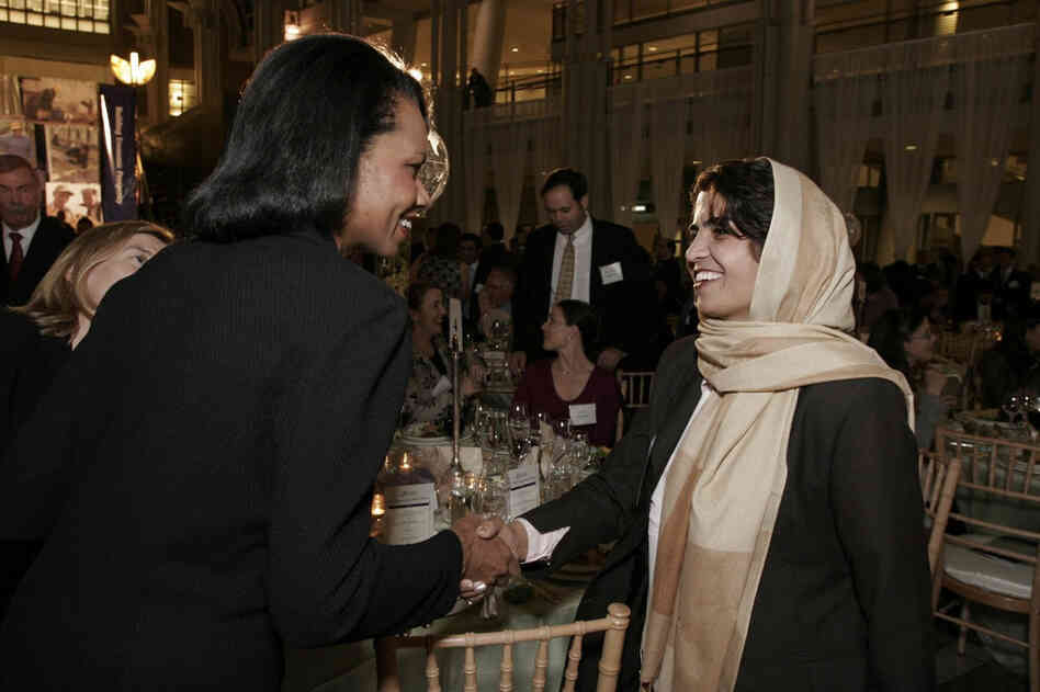 Kamila receiving congratulations from Condoleezza Rice. Courtesy US Global Leadership Campaign.
